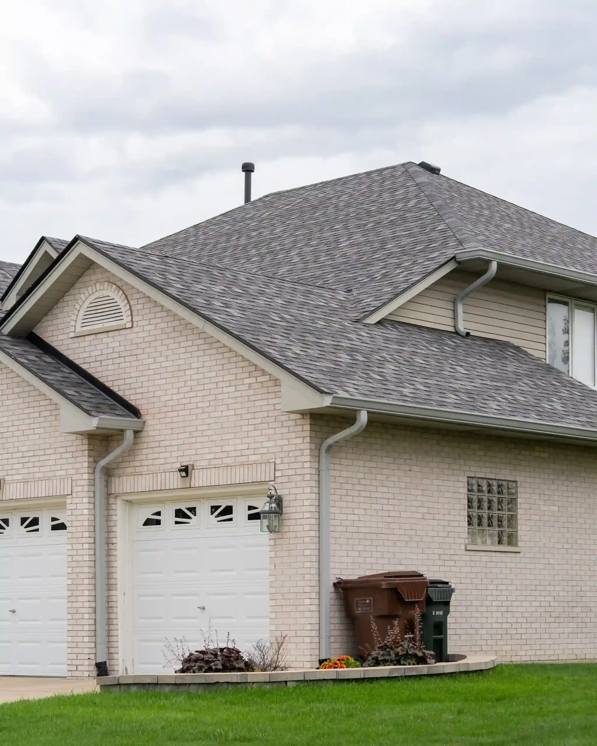 Completed roof and gutter installation on a Chicagoland home